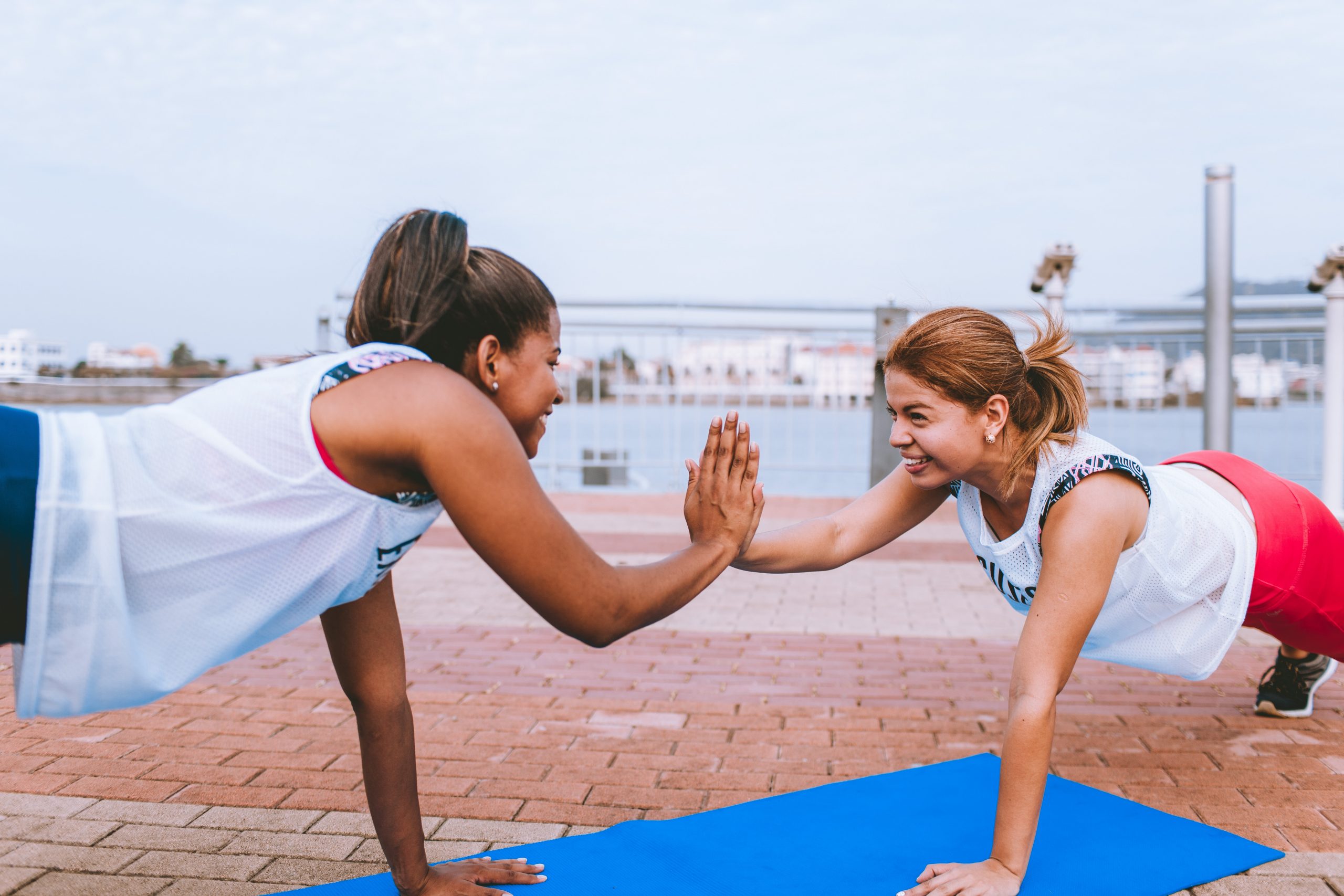 women exercising outdoors