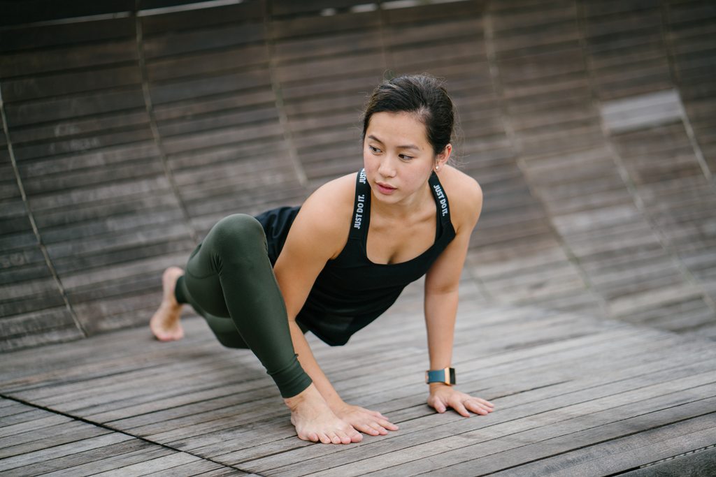 woman stretching her legs 